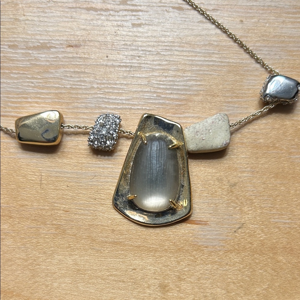 Alexis Bittar gold toned necklace with taupe ‘stone’